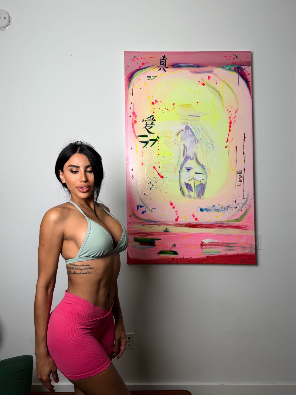 Andrea Duarte standing beside True Love in her home in Miami